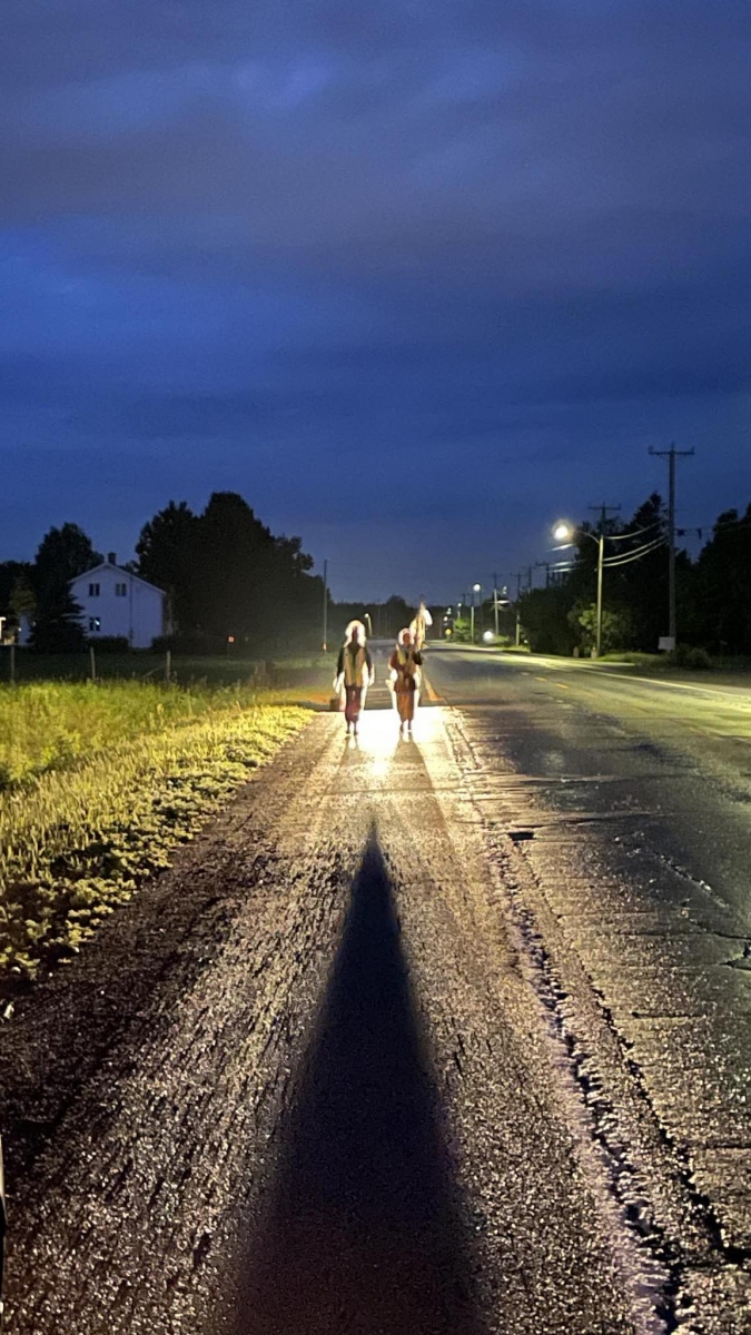 walkers before sunrise on Water Walk
